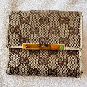 GUCCI GG SMALL MONOGRAM BI-FOLD WALLET AUTHENTICATION CERTIFICATE